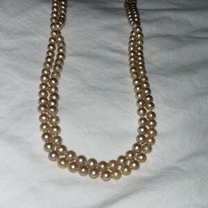 Vintage silver tone creamy beige glass pearl knotted strand spring clasp 48”